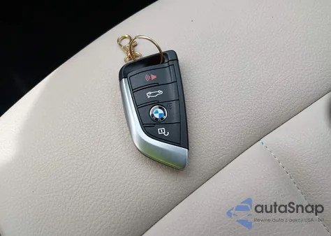 2021 BMW X1 xDrive28I из США, поврежденный, VIN WBXJG9C06M5T16773